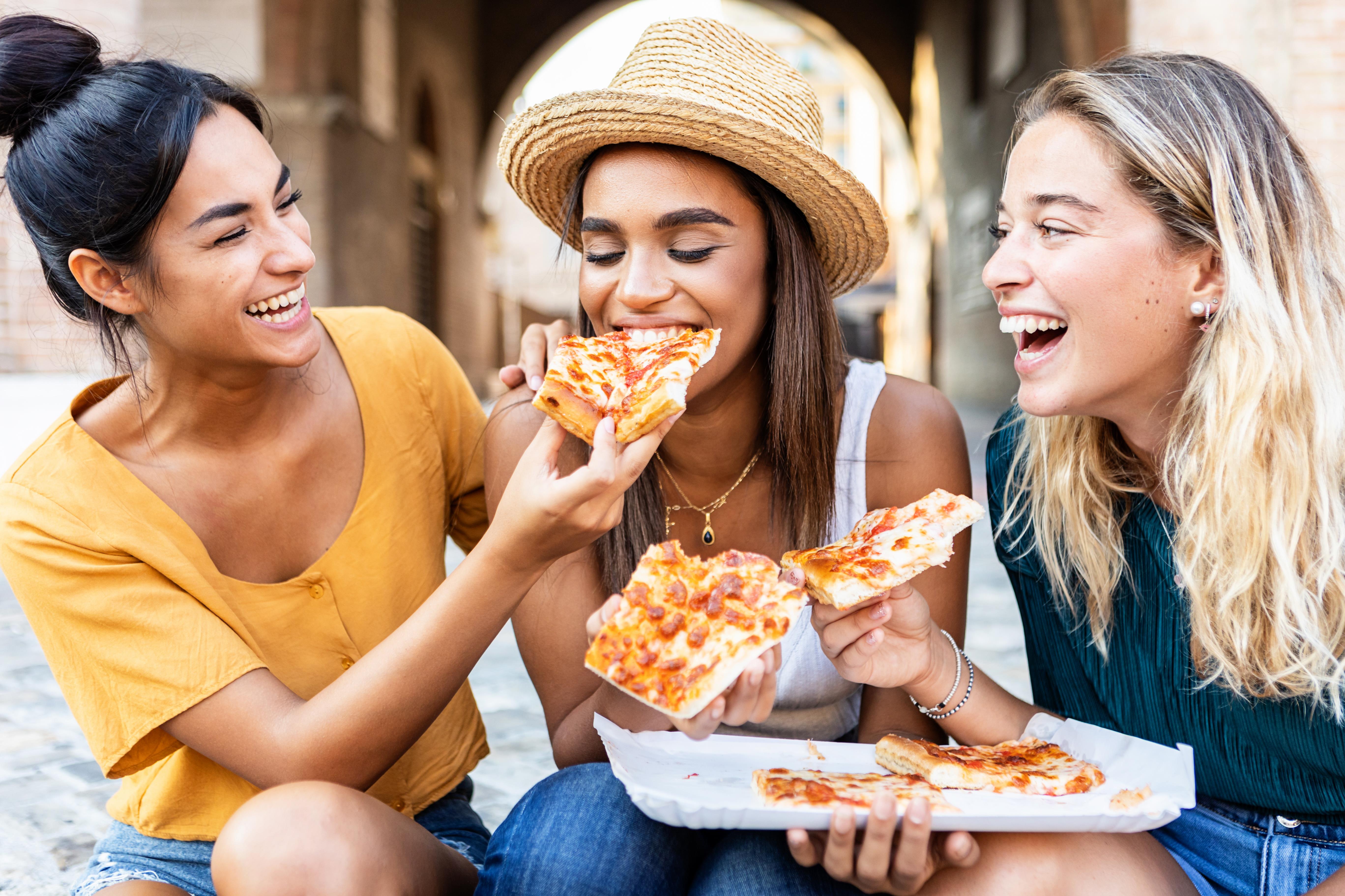 Pizza 3 Girls_GettyImages-1345278245.jpg